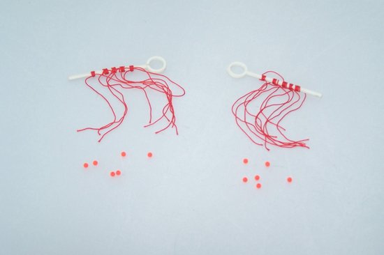 Draad - stuitjes - stopper - dobber - schuifdobber op "key" Medium totaal 25 stuitjes van Stonfo