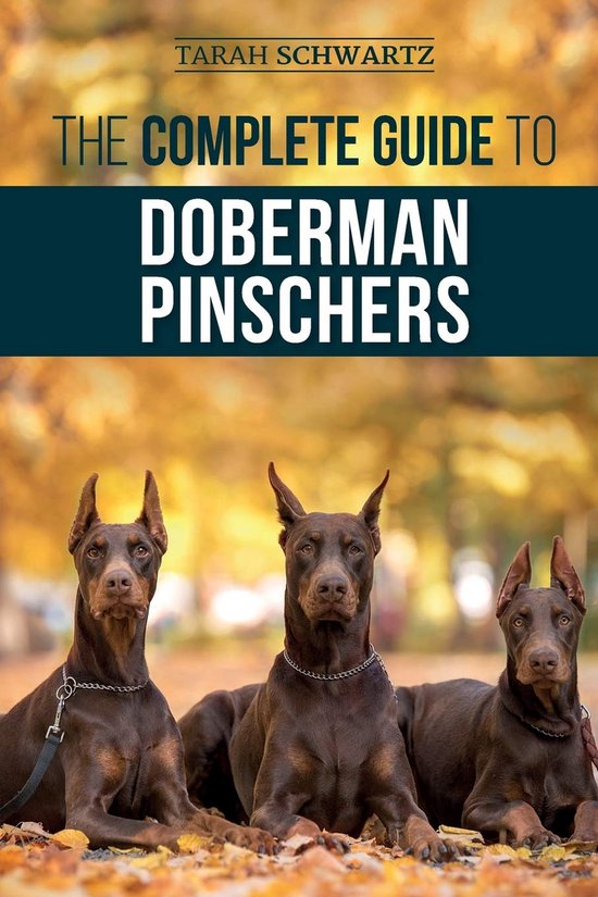 The Complete Guide to Doberman Pinschers: Preparing for, Raising, Training, Feeding, Socializing, and Loving Your New Doberman Puppy van Merkloos